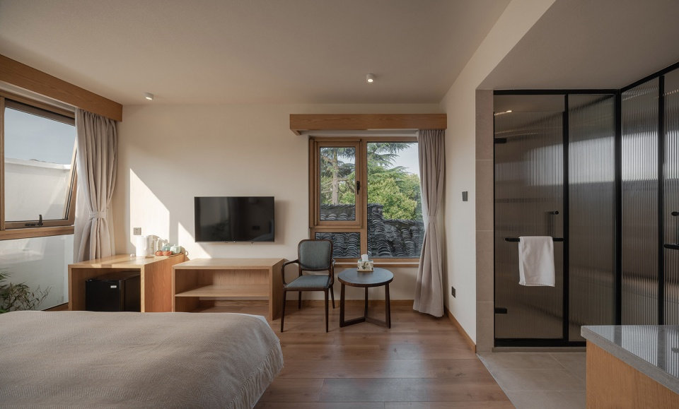 郑州旧房改民宿装修-花里精品民宿开云中国装修实景图